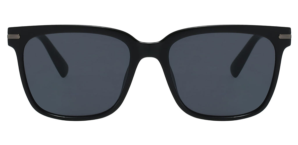 Front facing view of a black square sunglasses frame with dark lenses, a molded plastic construction, and a lightweight design on a white background. Metal brads on outer corners for an attractive accent. Saddle bridge dips into flared nose pad as part of the frame.