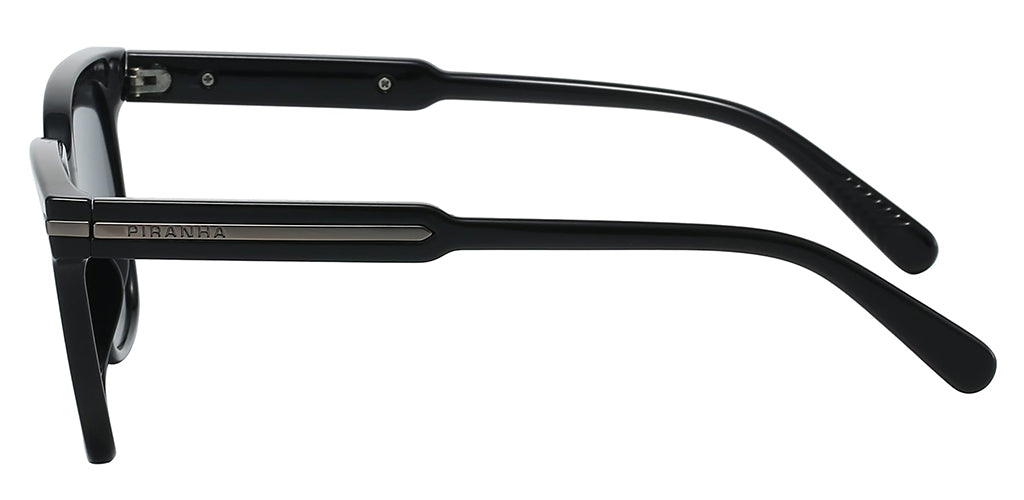 Left side facing view of a black square sunglasses frame with dark lenses, a molded plastic construction, and a lightweight design on a white background. Metal brads on outer corners for an attractive accent. Saddle bridge dips into flared nose pad as part of the frame. Ear tips gently curve behind the ear, metal accent on temple has PIRANHA san serif logo imprinted.
